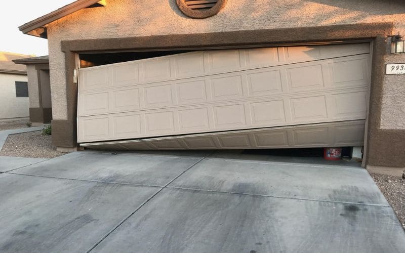 Off-track garage door repair San Diego